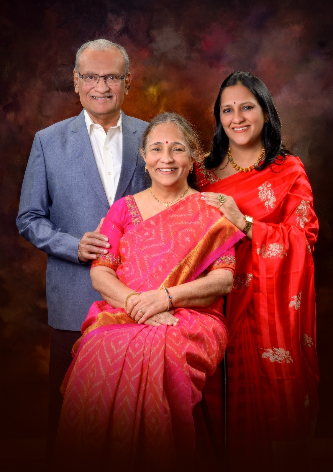 Three generations of the Mangalam Sarees family inside their Pune store